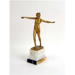 A GILT-BRONZE ART DECO FIGURE OF A DANCING NUDE WOMAN