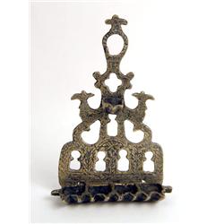 A BRASS MOROCCAN-STYLE MENORAH