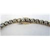 Image 3 : A 14K YELLOW GOLD AND DIAMOND LINE BRACELET