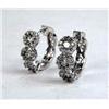 Image 1 : A PAIR OF 14K WHITE GOLD AND DIAMOND EARRINGS