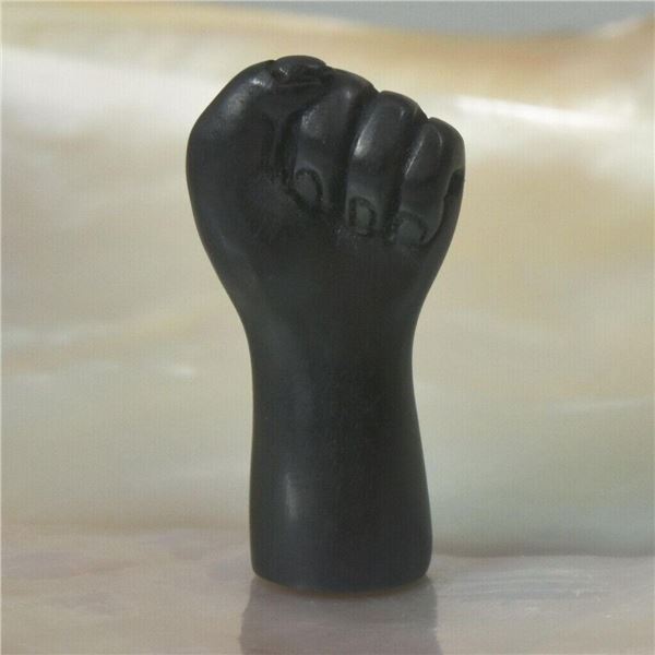 Black Wood Carved Solidarity Fist Pendant