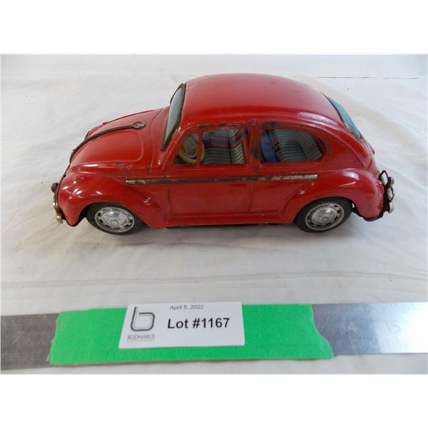 Volkswagen Tin Battery operated car (damaged drive wheel, missing battery cover, untested)