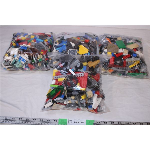 2X THE BID PRICE - (4) large bags of Legos