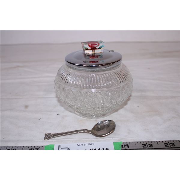 Glass sugar bowl with spoon