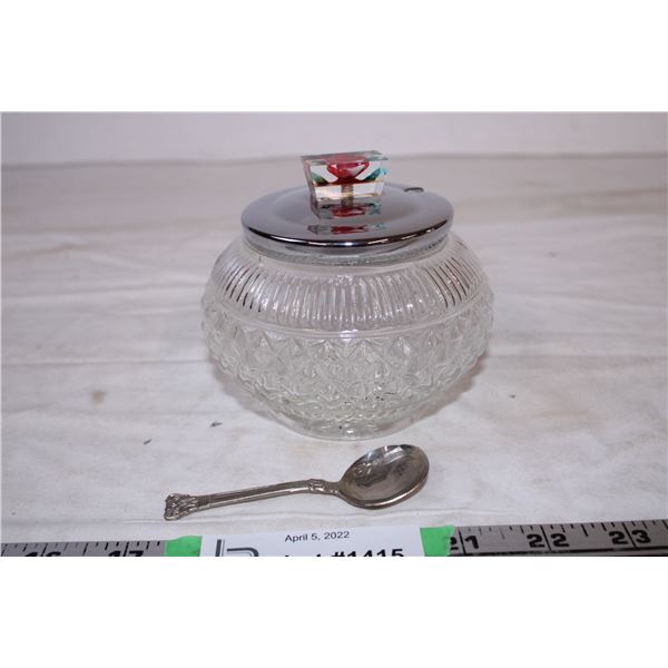 Glass sugar bowl with spoon