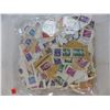 Image 2 : (2) Large bags of stamps on paper