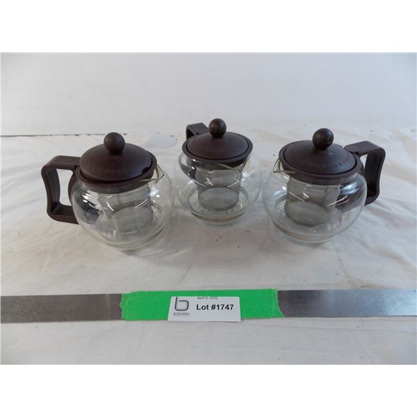 (3) small tea pots - one cracked on spout