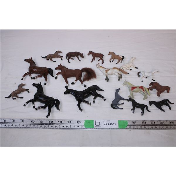 various plastic horses