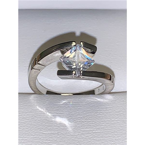 Ladies .80 carat Floating Princess Cut Solitaire off set ring size 7