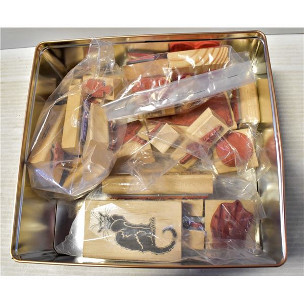 TIN OF STAMP MOULDS