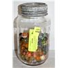 Image 1 : VINTAGE GLASS JAR WITH ASSORTED MARBLES