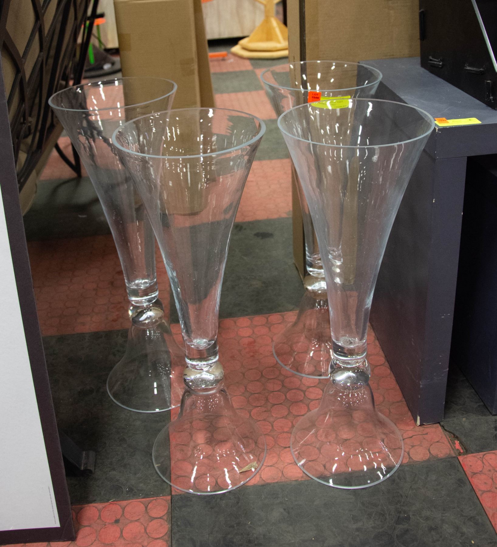 SET OF 4 GLASS DISPLAY VASES EACH APPROX 24" TALL