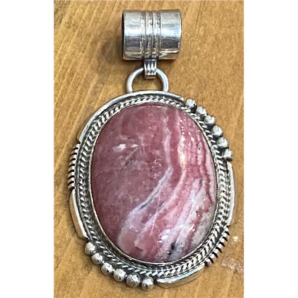 Beautiful Rhodochrosite Stone set in Sterling Silver and Hallmarked with the Running Bear.