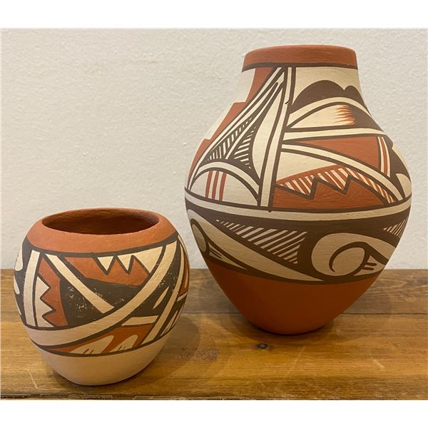 Two Nice Jemez Pueblo Pieces are in this lot.  The Jar signed MC The Smaller Bowl is signed.