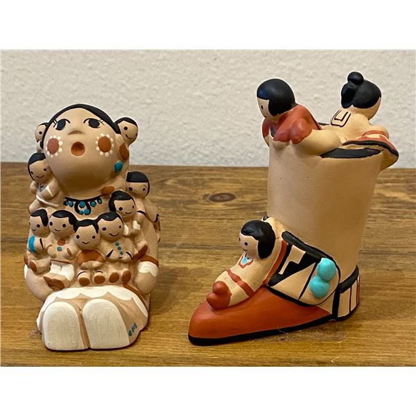 A Storyteller and Children playing in a Boot.  Signed Teissedre 86 and Teissedre 91