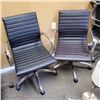 Image 1 : 2 CHROME AND BLACK LEATHER LOOK GAS LIFT OFFICE ARMCHAIRS