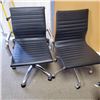 Image 1 : 2 CHROME AND BLACK LEATHER LOOK ROLLING OFFICE CHAIRS ONE IS GAS LIFT