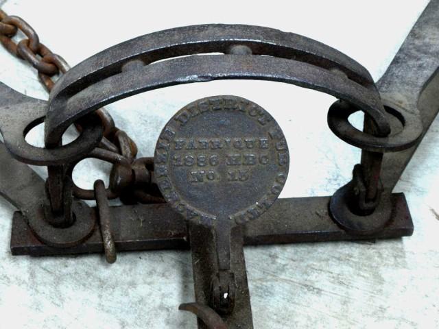 Antique bear trap by Mackenzie Distriot Fur Co.