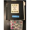 Image 1 : Group of contact lenses w/ photo of eyes journal
