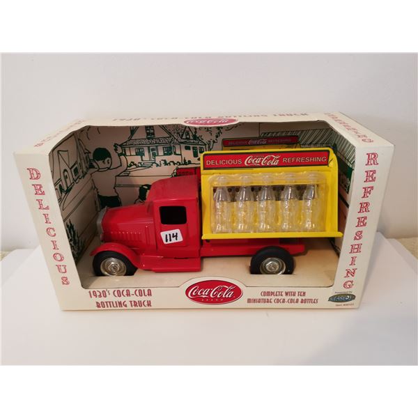 1930's Coca-Cola bottle truck with 10 glass bottles