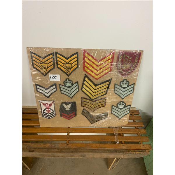 13 assorted fabric crests