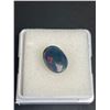 Image 3 : Natural Welo Black Opal 1.655ct 10.75 x 8.10 x 3.98mm Oval Cabochon Ethiopia Heated Plenty Play of C