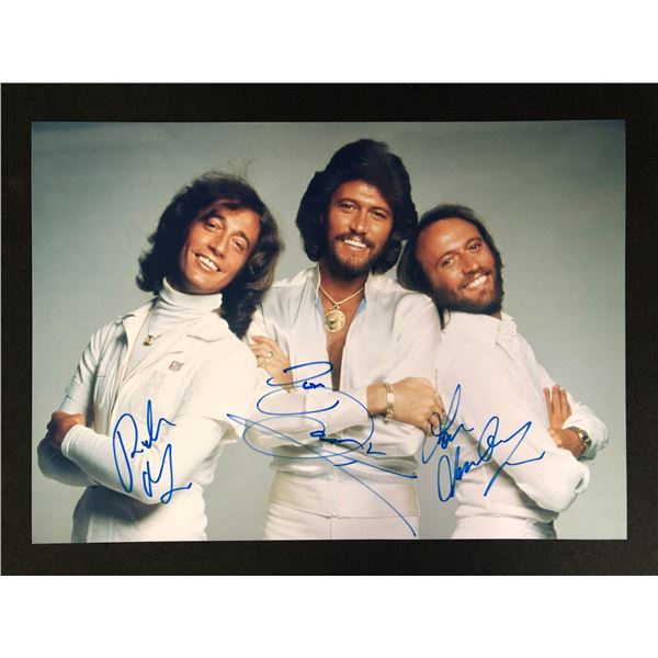 THE BEE GEES BAND SIGNED 8 X 10 (RA COA)