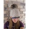 Image 2 : Merino wool toque with lynx fur pom pom and a amethyst and quartz crystal bracelet with a turquoise