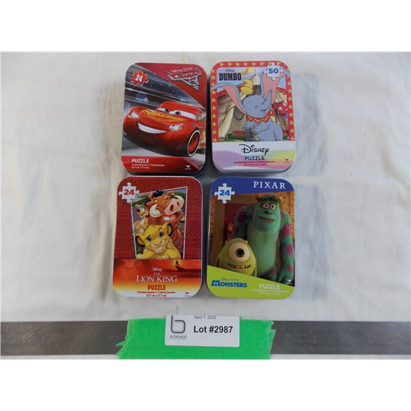 (4) Mini puzzles in tins - Lion King, Cars, Dumbo, Monsters Inc