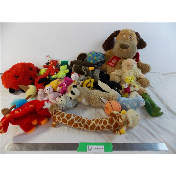 lot of dog toys - some squeaky, various stuffed animals