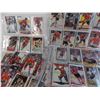 Image 3 : Sleeves of hockey cards + NHL 2K9