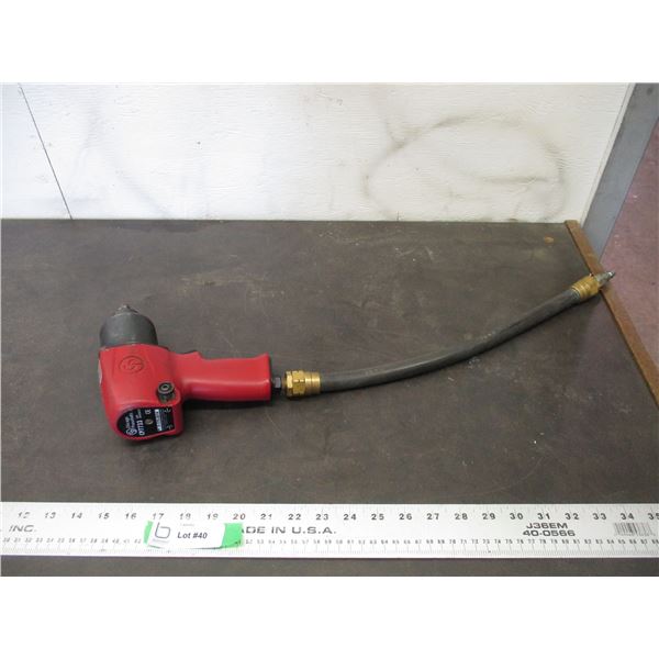 Chicago Pneumatic air wrench with 19" air hose (working)