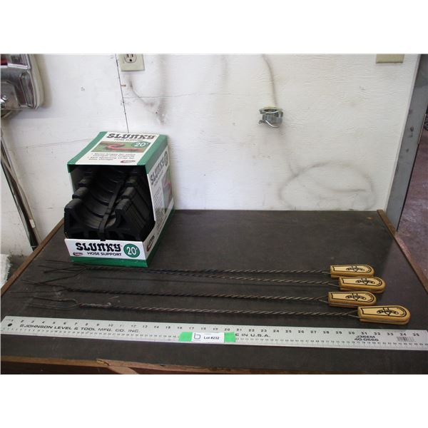 Fire Pit sticks + slunky hose support