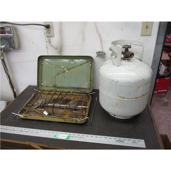 Vintage camp stove with propane bottle