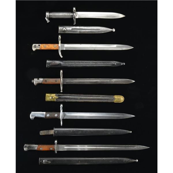 GROUP OF 5 WWII ERA BAYONETS WITH SCABBARDS.