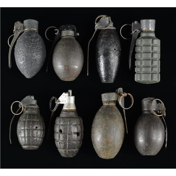 8 INERT FOREIGN CAST IRON IMPROVISED GRENADES.