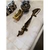 Image 2 : 3 TABLE TOP LIGHTERS, BRASS DECOR AND BELT MONEY DISPENSER