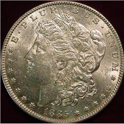 1885 P Morgan Silver Dollar. AU