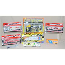 Lot of 5 Racing Trucks NIP and some other loose trucks