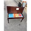 Image 2 : Piano bench and books