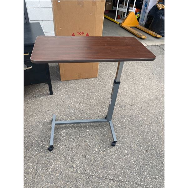 Height adjustable table