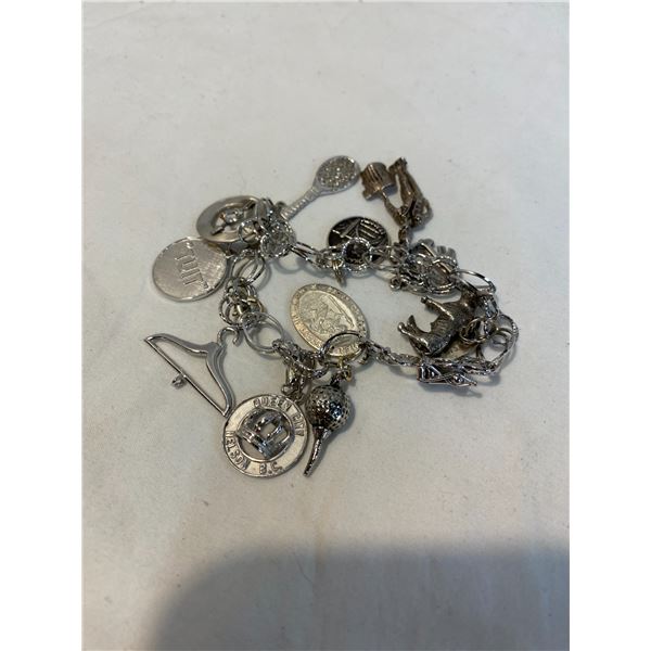 Charm bracelet and charms most marked