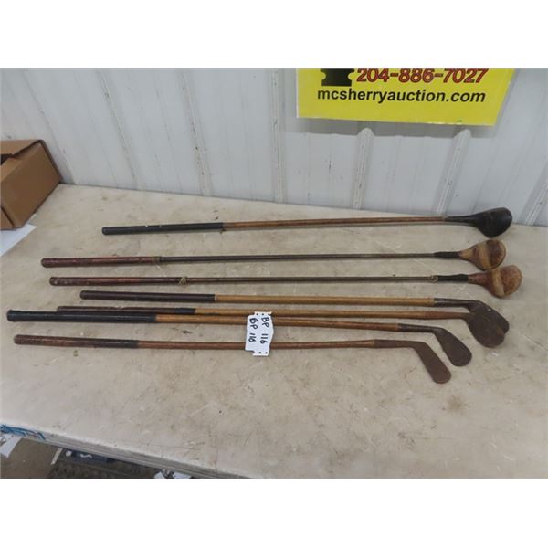 7 Golf Clubs - 5 have Wooden Handles