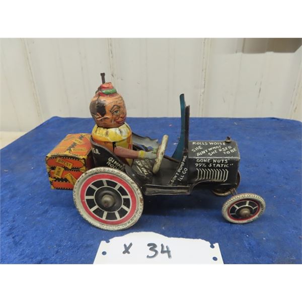 The Ridem Rough Tire Company Wind Up Tin  Car 8" x 6" x 3"