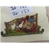 Image 1 : VIntage Cast Iron Wall Plaque of American  Woman  Hanging Out Laundry  6" Wide up to 3.5" Tall