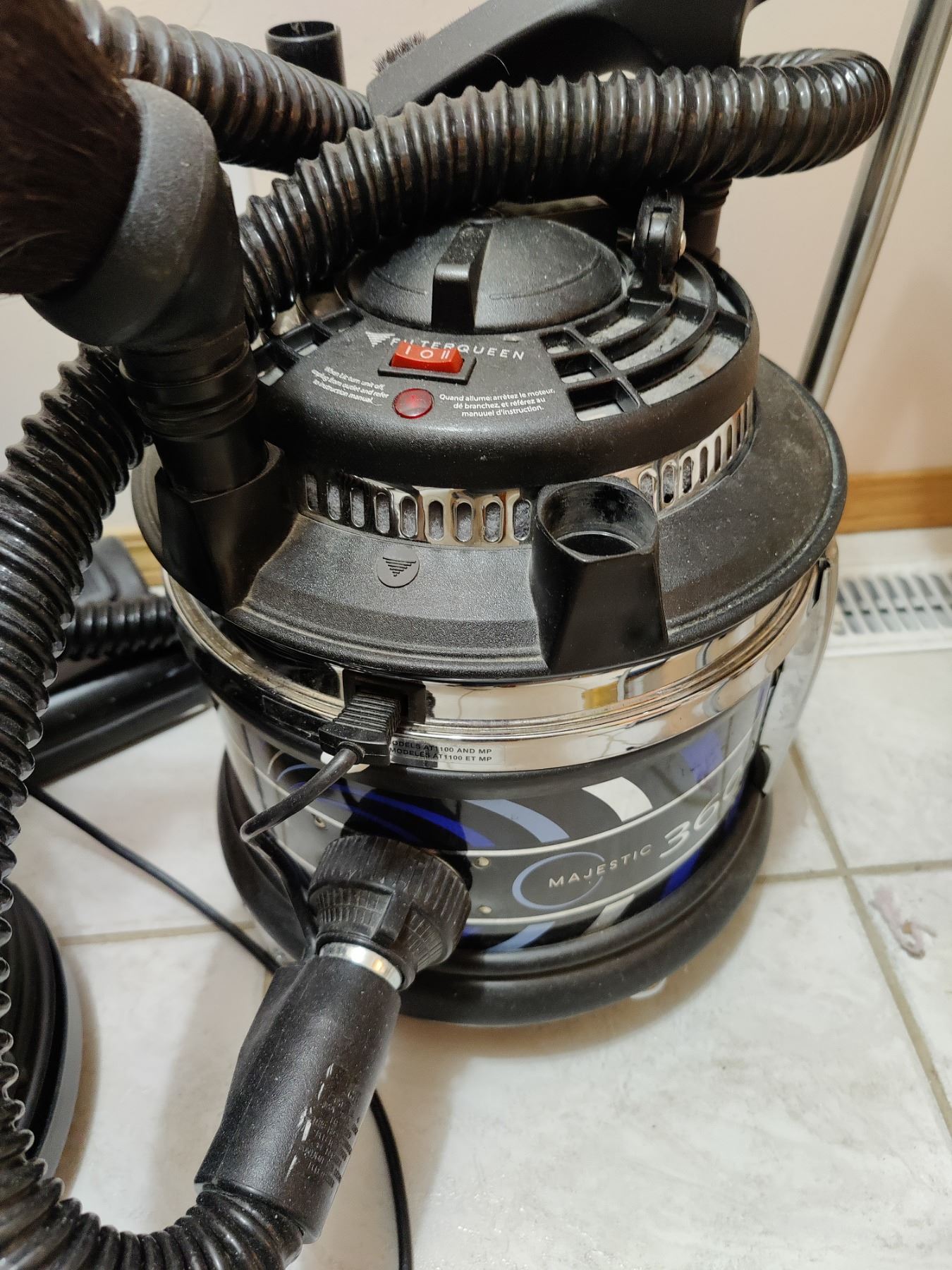 The Hoover Floor Polisher Model 0211 Filter Queen Vacuum Model AT1100