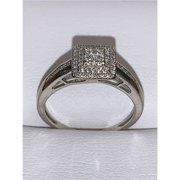 Ladies 10K Gold .68 Carat SI-I Graded round cut diamond cluster ring with Appraisal $3,700.00