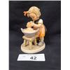 Image 1 : VINTAGE GIRL GIVING DOLLY A BATH HUMMEL APPROX 5"