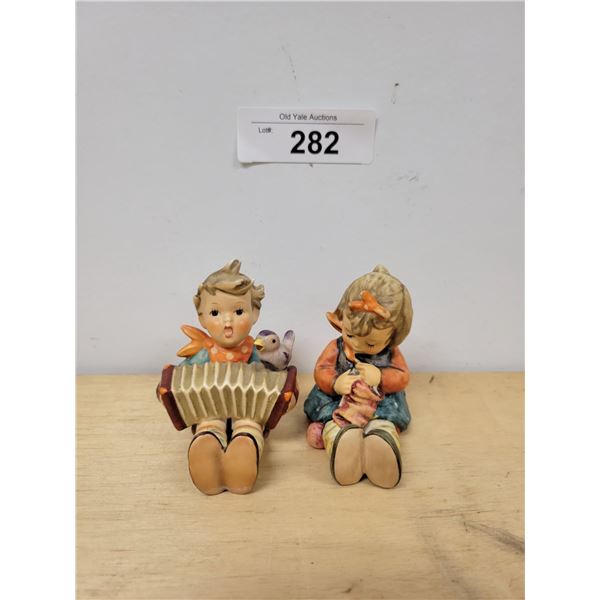 TWO VINTAGE HUMMEL FIGURINES