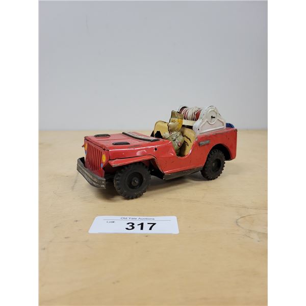 VINTAGE WINCH JEEP TIN FRICTION TOY